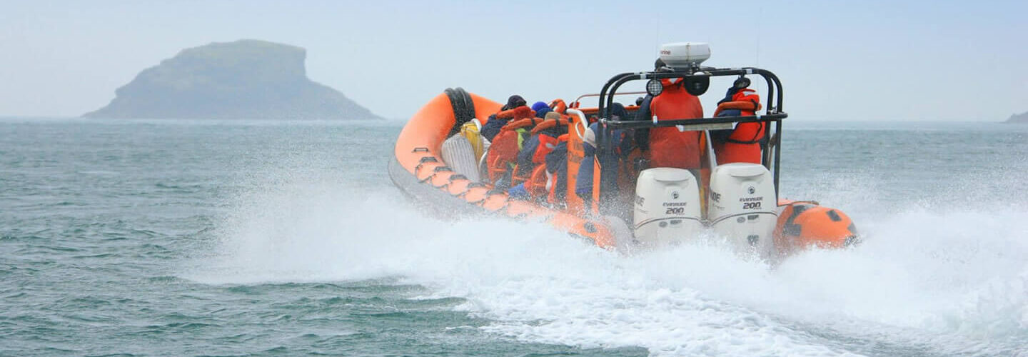 Rib boat from astern.